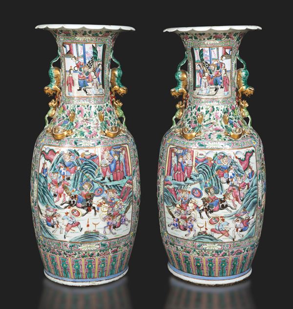 Pair of large porcelain Famille Rose vases with scenes of common life within reserves, floral decorations, Pho dog-like handles and relief dragon figures, China, Qing Dynasty,Guangxu era (1875-1908)