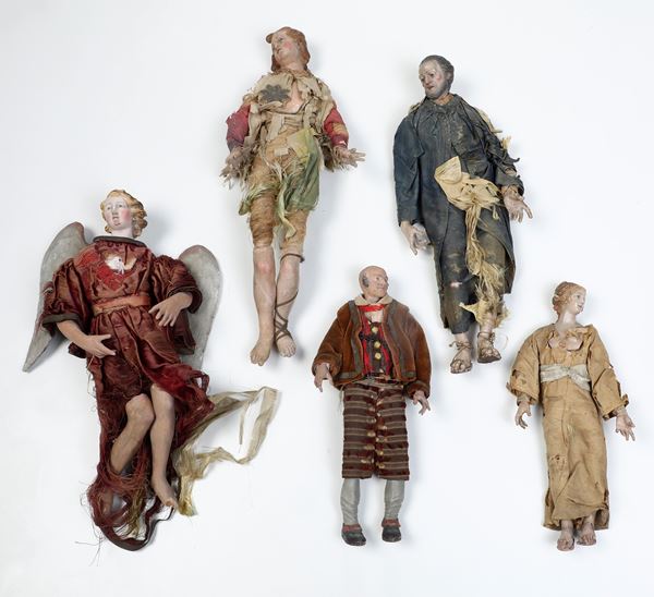 Insieme di cinque sculture da presepe. Arte presepiale napoletana del XIX secolo