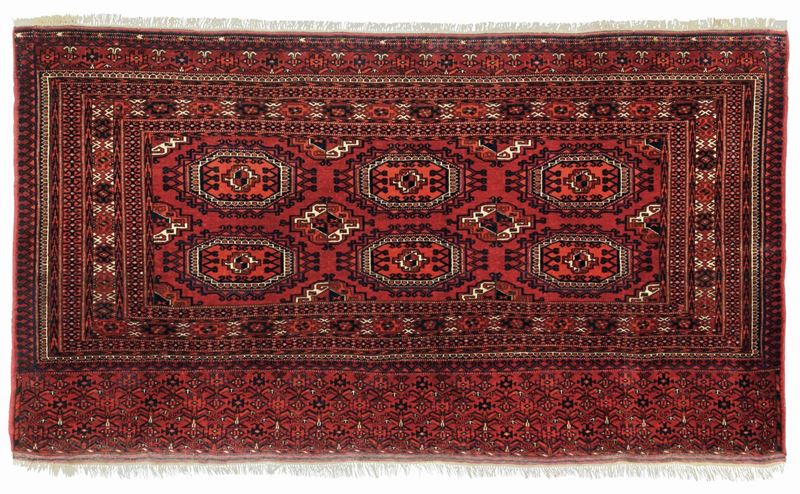 Sacca Salor. Turkestan occidentale inizio XX secolo campo rosso con gul  - Auction Antique carpets - Cambi Casa d'Aste