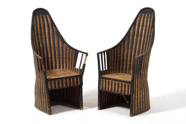 Coppia di poltrone in rattan. XX secolo