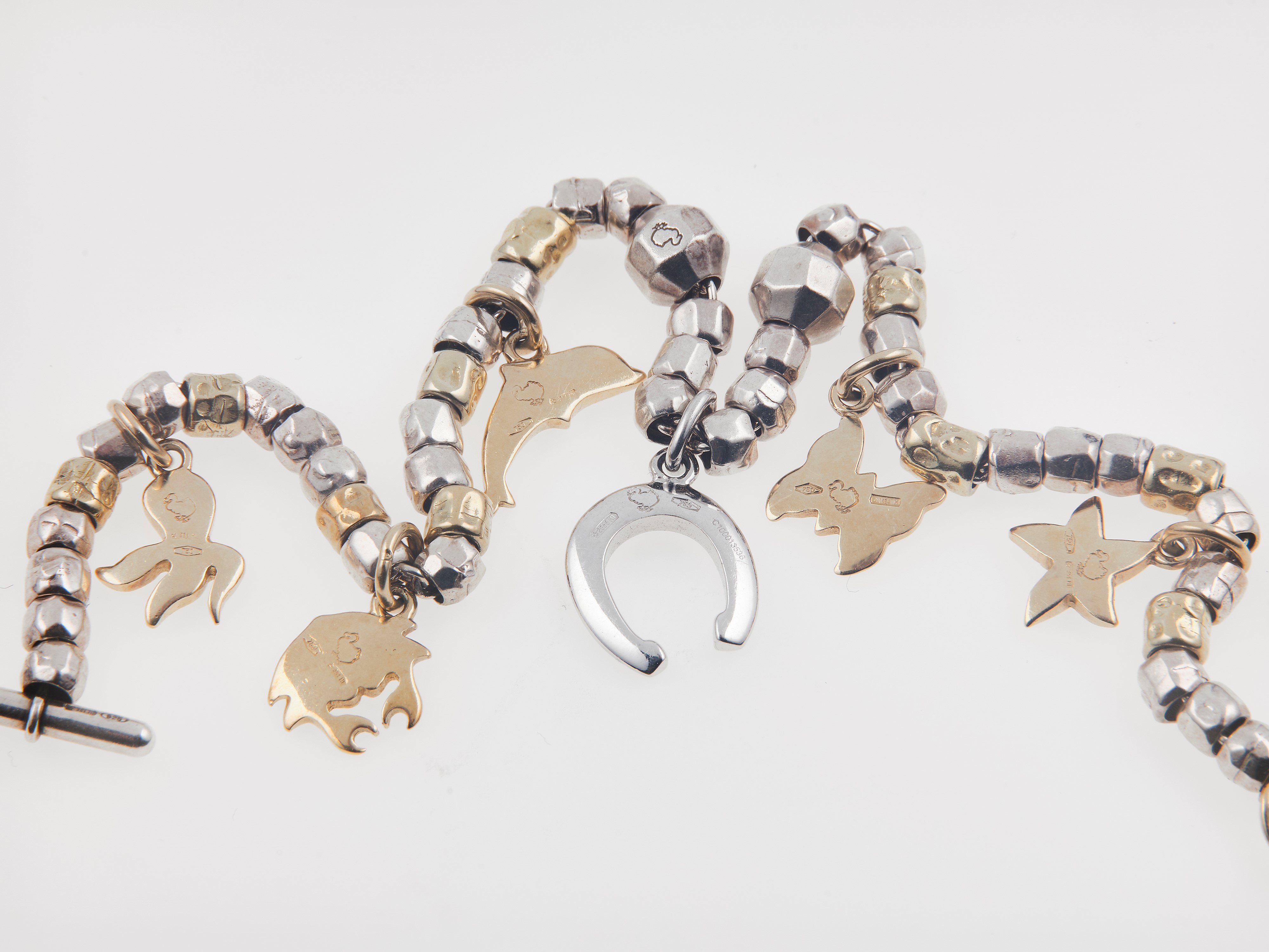Pomellato. Bracciale “dodo” con Charms e Piccoli Diamanti