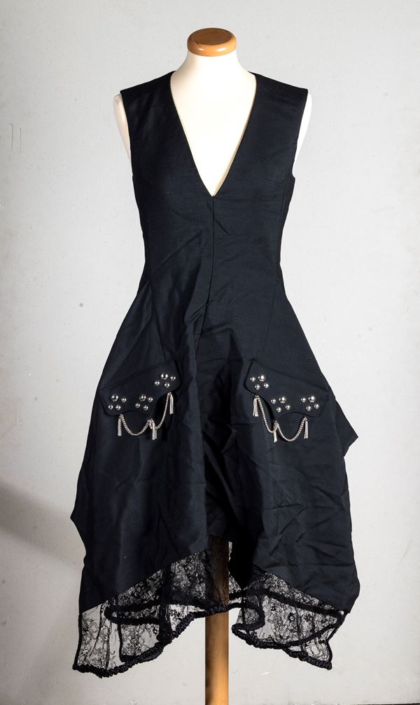 Louis Vuitton Abito nero in Mohair e lana con inserti in acciaio con borchie  - codice identificativo n. RW181A FIT FEDB72 TG 34, difetti