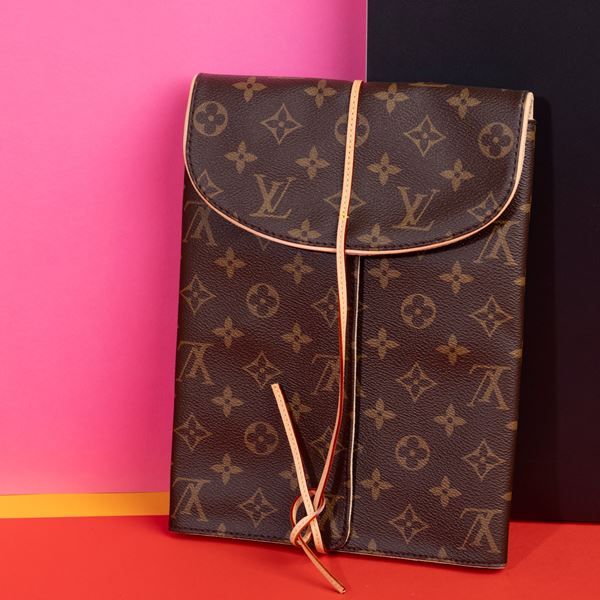 Louis Vuitton  Custodia da viaggio per gioielli in canvas monogram, difetti, in ottime condizioni, dustbag