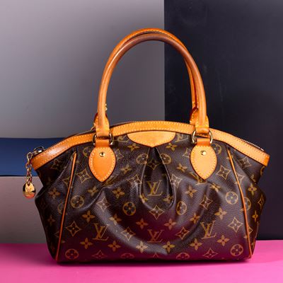 Louis Vuitton Tivoli in Canvas Monogram e Pelle, Difetti, in Ottime Condizioni, Dustbag
