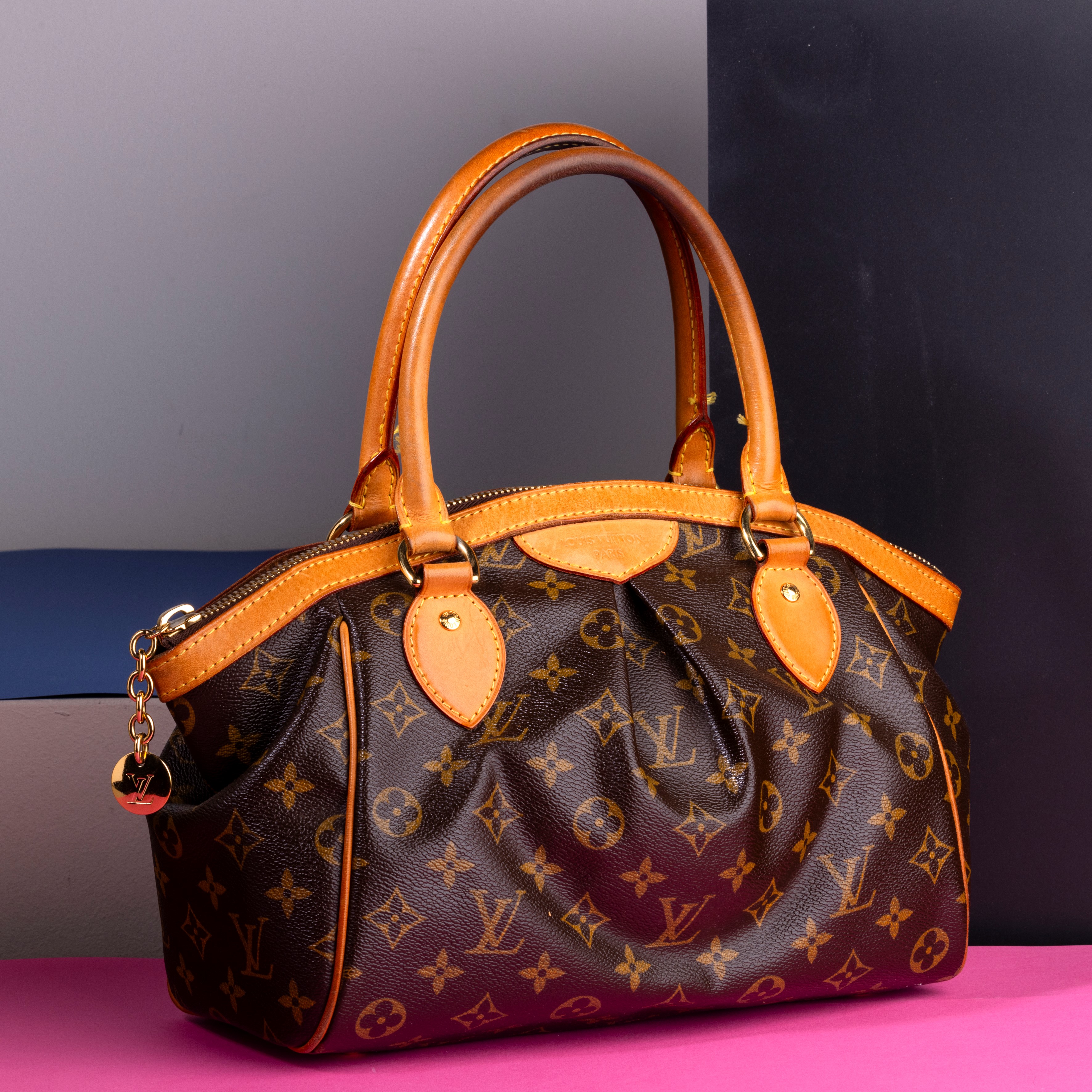 Louis Vuitton Tivoli in Canvas Monogram e Pelle, Difetti, in Ottime Condizioni, Dustbag