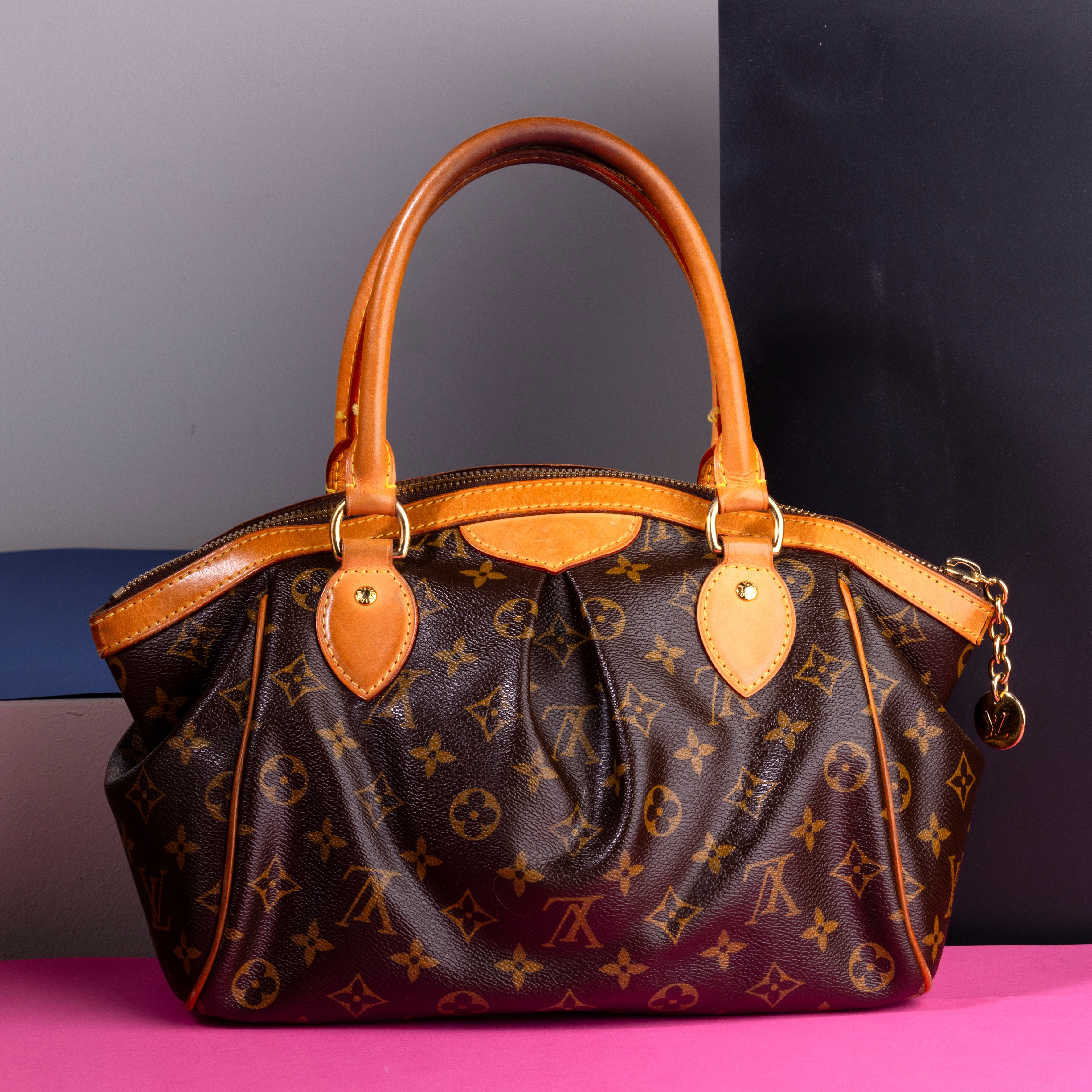 Louis Vuitton Tivoli in Canvas Monogram e Pelle, Difetti, in Ottime Condizioni, Dustbag