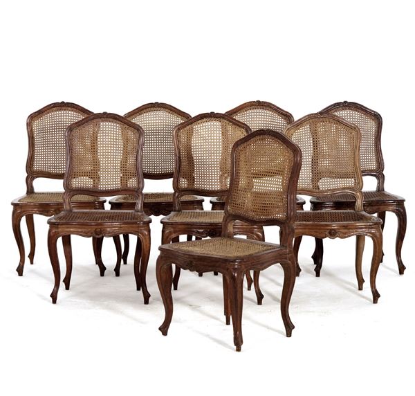 Otto sedie in legno intagliato. XVIII secolo