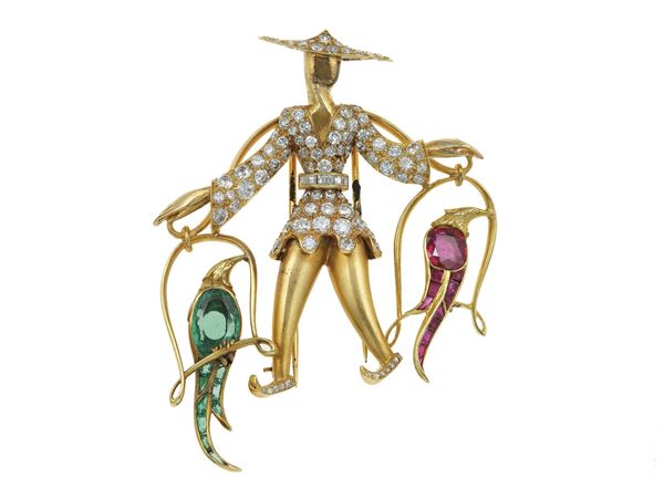 Diamond, emerald and ruby "oriental figurine" brooch. Signed Koven Frères