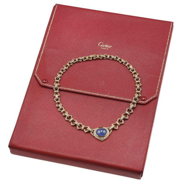 Sapphire, emerald, diamond and gold necklace. Signed Cartier Paris, partly illegible serial numbers. Fitted case
