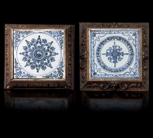 Pair of blue and white porcelain tiles with Taoist and Tibetan symbols, China, 15th century