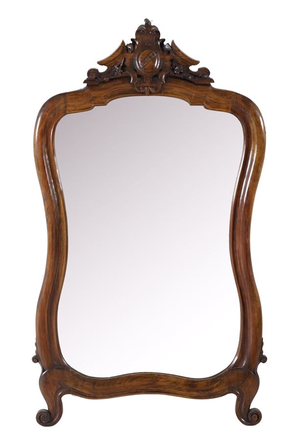 Specchiera in legno intagliato. XIX secolo