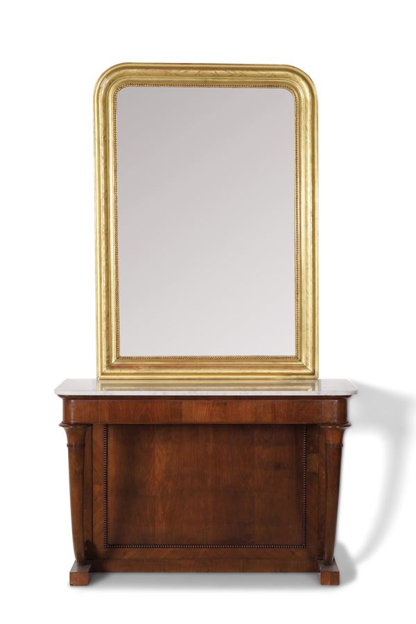 Consolle con piano in marmo e specchiera dorata. XIX secolo