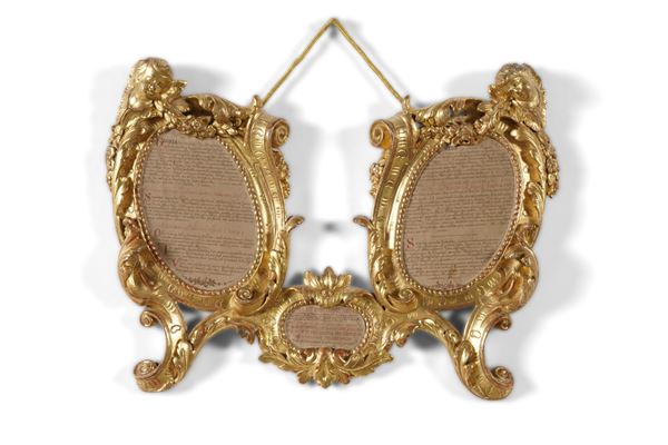 Cornice cartagloria in legno intagliato e dorato. XVIII secolo