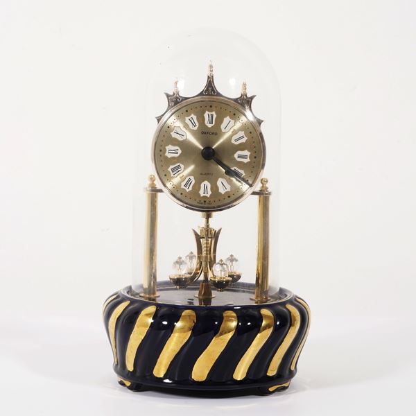 Orologio sotto campana di vetro, XX secolo
