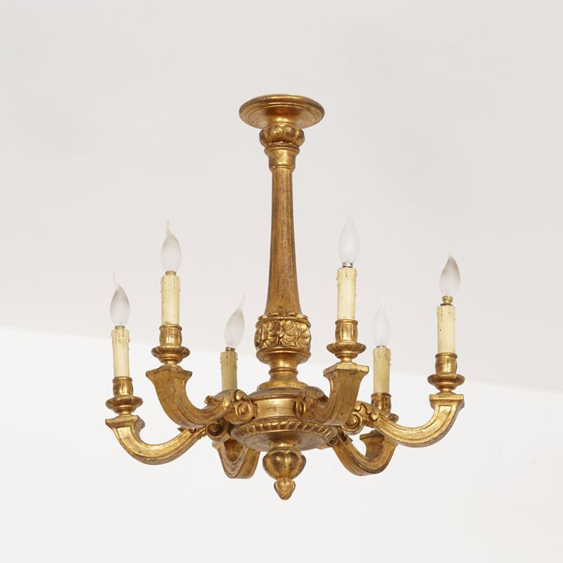 Lampadario a sei fiamme in legno intagliato e dorato. XIX secolo  - Asta Antiquariato - Cambi Casa d'Aste