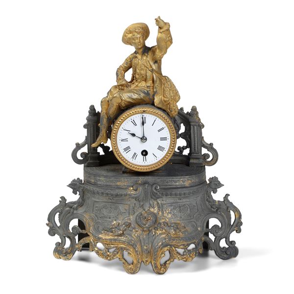 Pendola da tavolo in metallo e metallo dorato. XX secolo