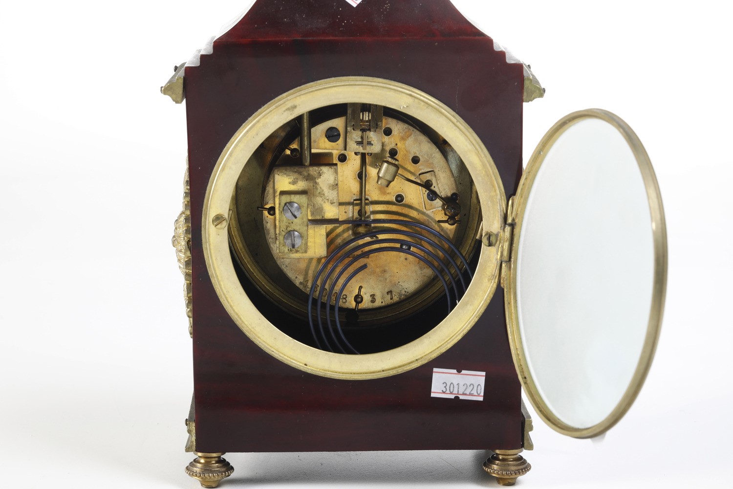 Orologio da Camera con Cassa Lastronata in Tartaruga. XIX-XX Secolo