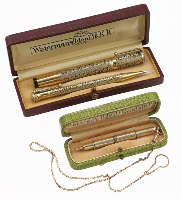 Two gold-plated propelling pencil and one pen. Cases and pen signed Waterman's