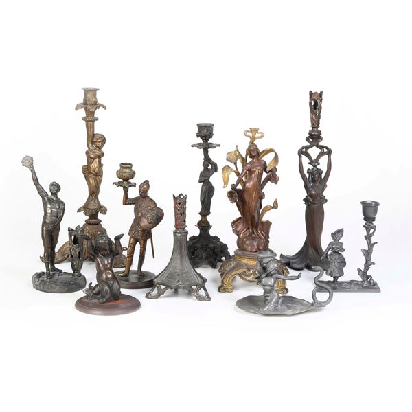 Lotto di candelieri in metallo e ottone