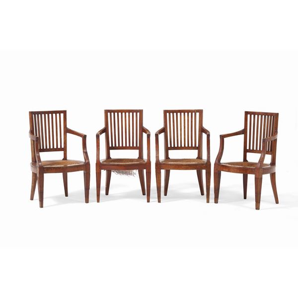 Quattro poltrone in legno. XVIII-XIX secolo