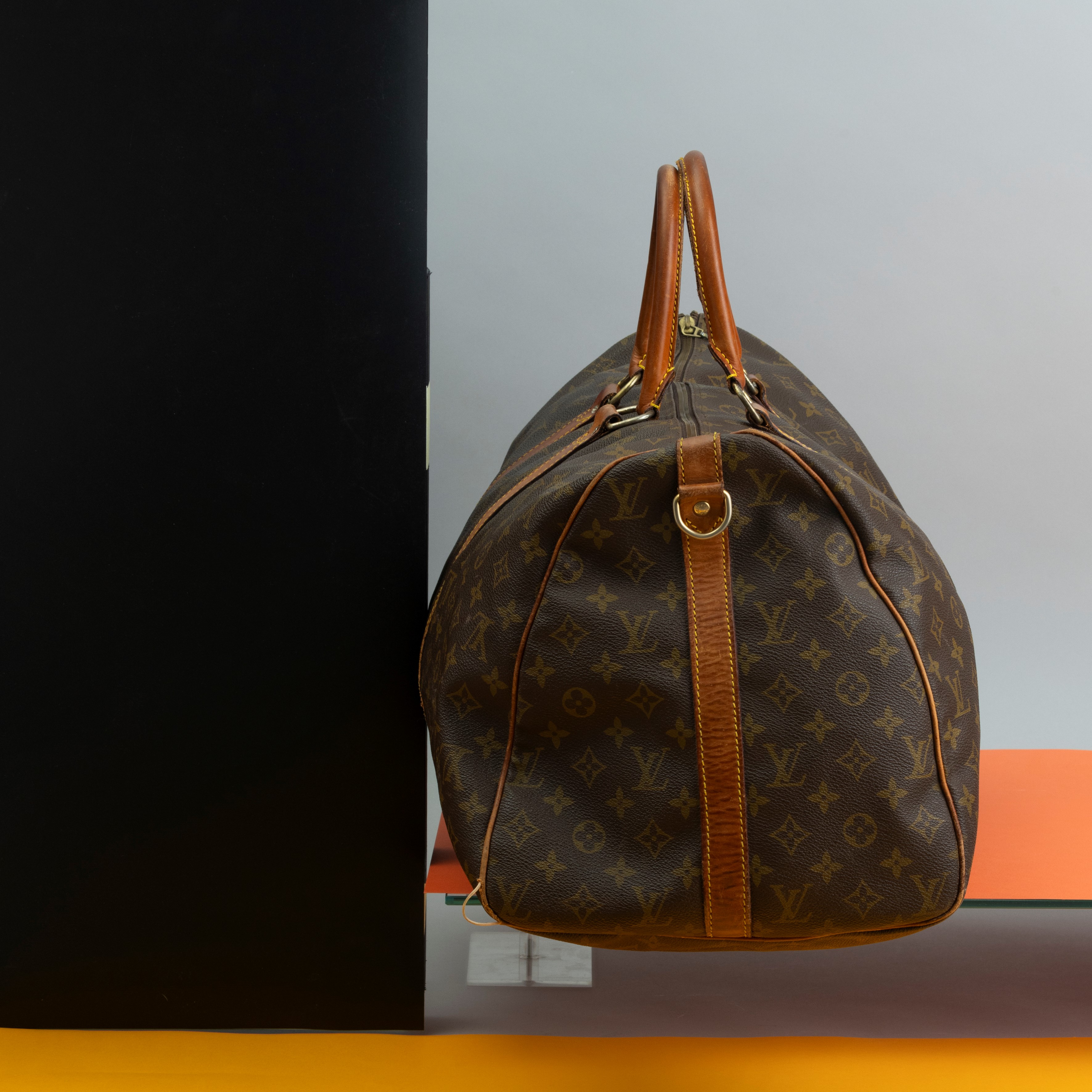 Louis Vuitton Borsone Keepall, Difetti, Rotture ai Manici, Scuciti