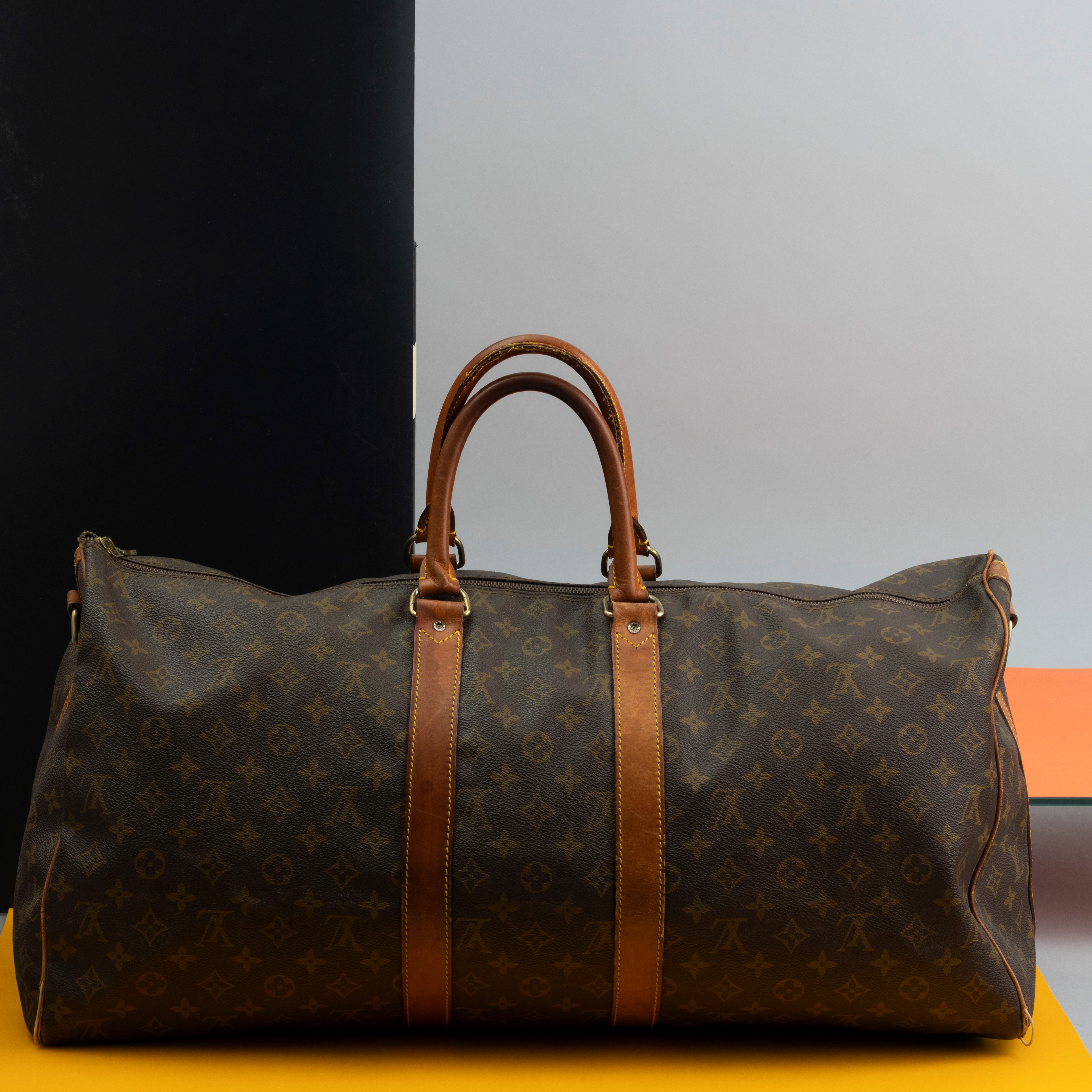 Louis Vuitton Borsone Keepall, Difetti, Rotture ai Manici, Scuciti