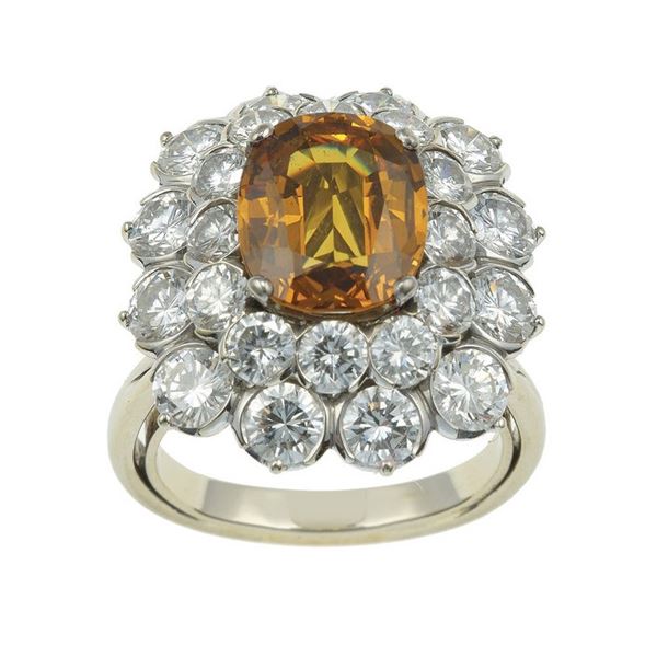 Yellow sapphire and diamond ring. Yellow sapphire is heated