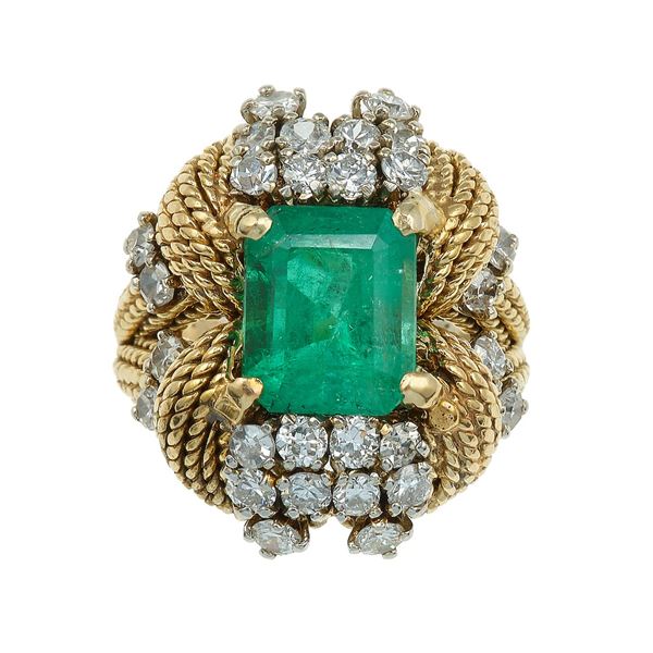 Emerald and diamond ring. "MADE IN FRANCE" is engraved inside