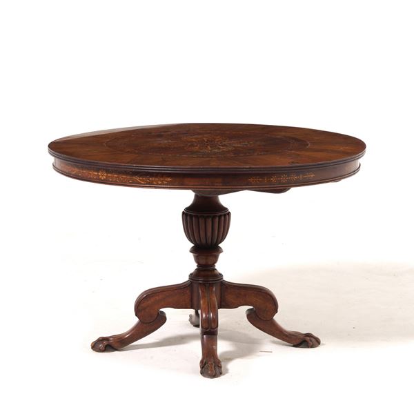 Tavolo circolare in legno lastronato ed intarsiato. XIX secolo