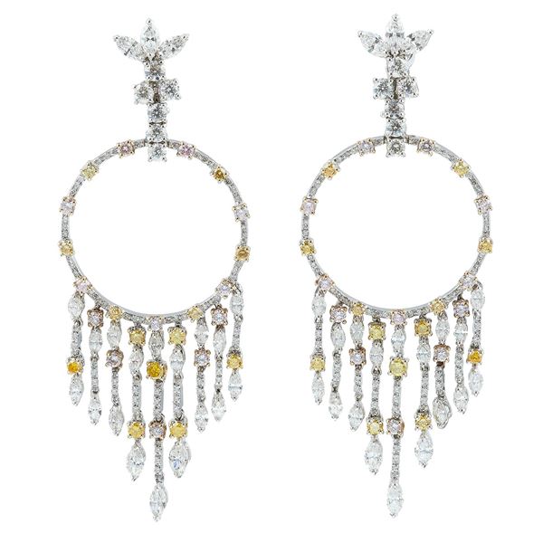 Pair of diamond and facy color diamond cascade frange earrings. Signed Pederzani
