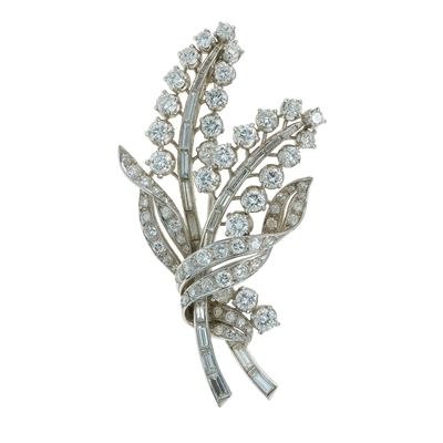 Spilla in platino con diamanti taglio rotondo e baguette