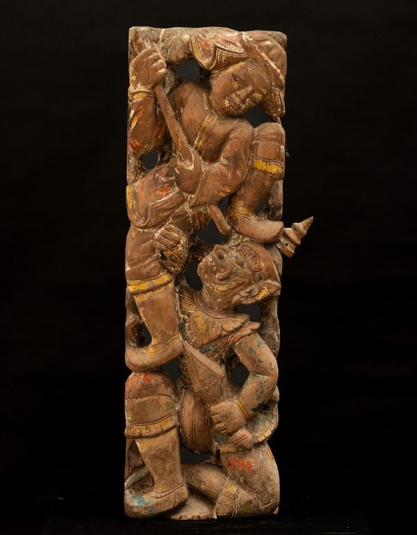 Fregio in legno raffigurante guerriero con demone, Thailandia, XIX secolo