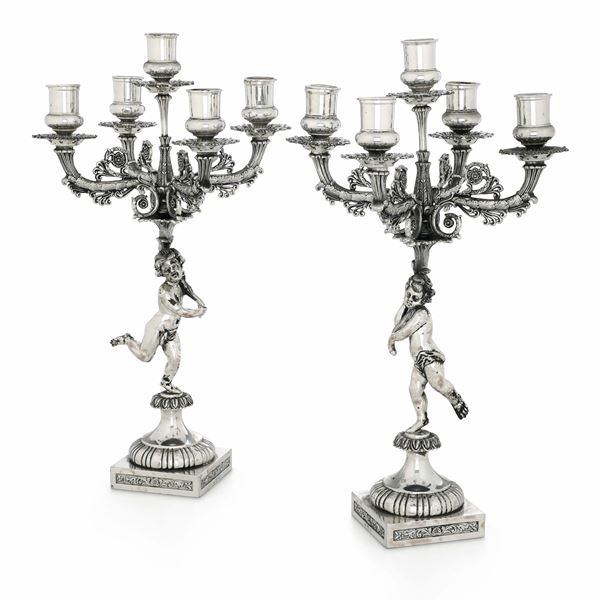 Coppia di candelabri a cinque fiamme. Argenteria artistica milanese del XX secolo. Argentiere Messulam