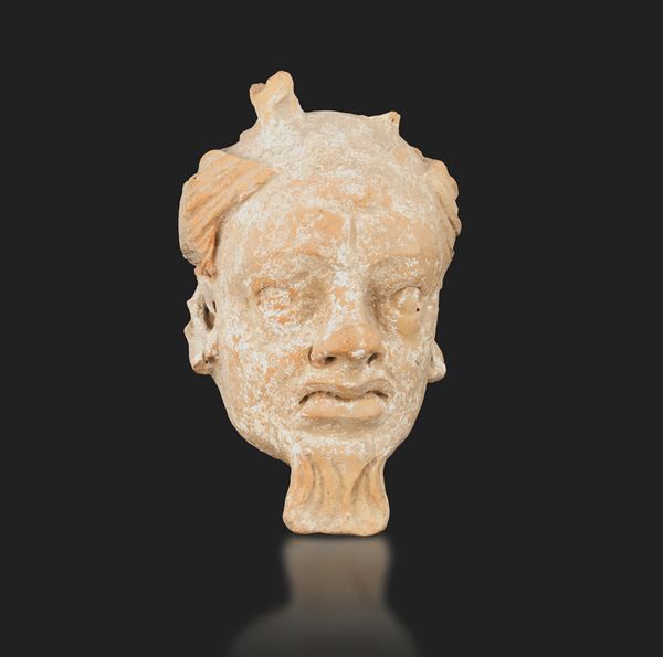 Terracotta demon head, Gandhara, 15th century