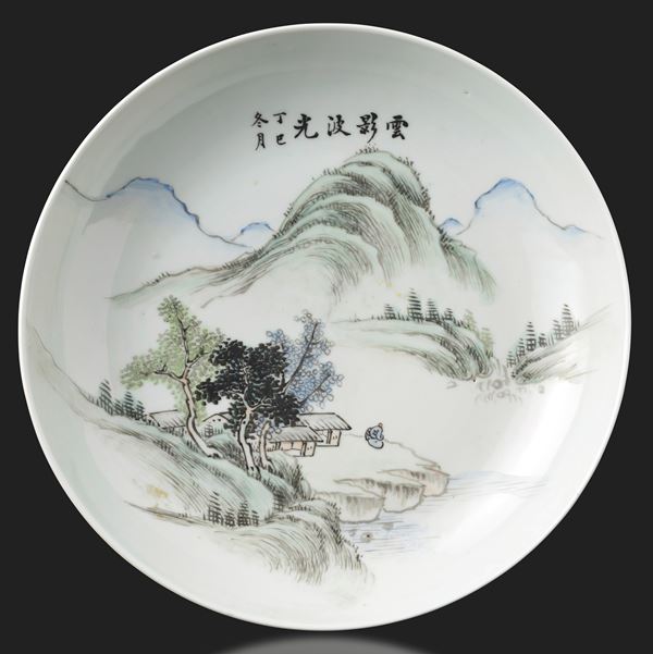 Porcelain plate depicting mountain landscape and inscription “winter month of the year Ding-si” (indicates year 1917), China, Republic Period, 20th century