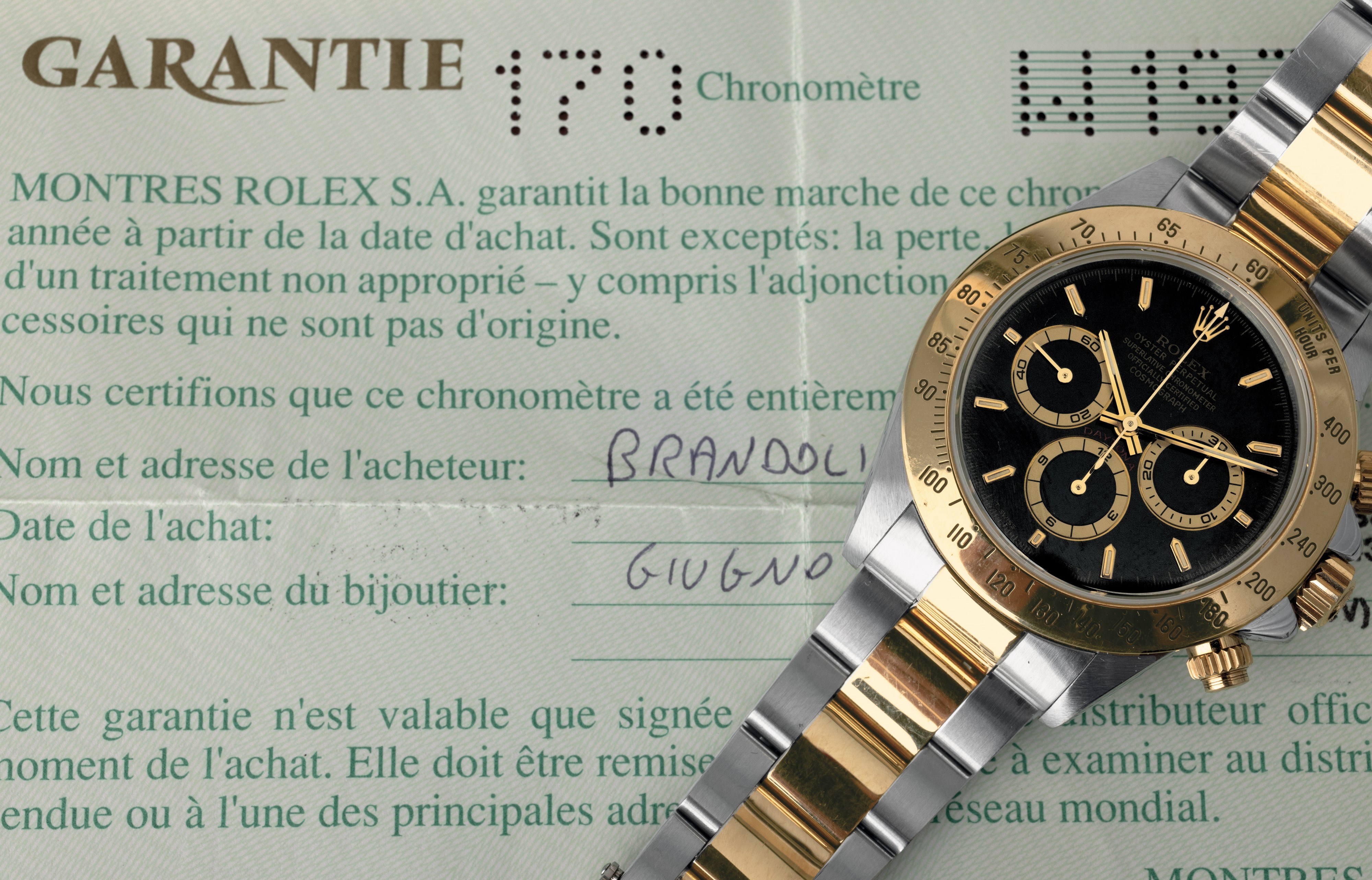 Rolex - Cosmograph Daytona Ref 16523 Acciaio e Oro, Quadrante Nero con Contatori Champagne e Brac...