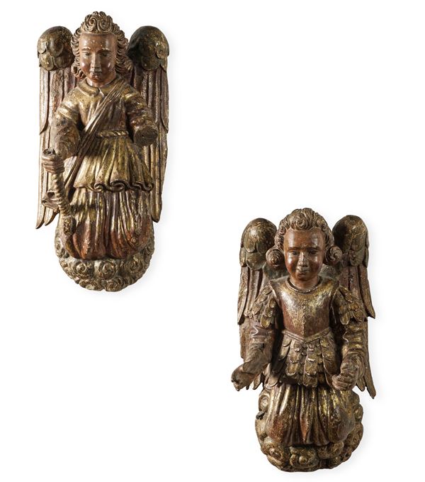 Scultore d'oltralpe del XVI-XVII secolo Coppia di protome raffiguranti angeli portacero