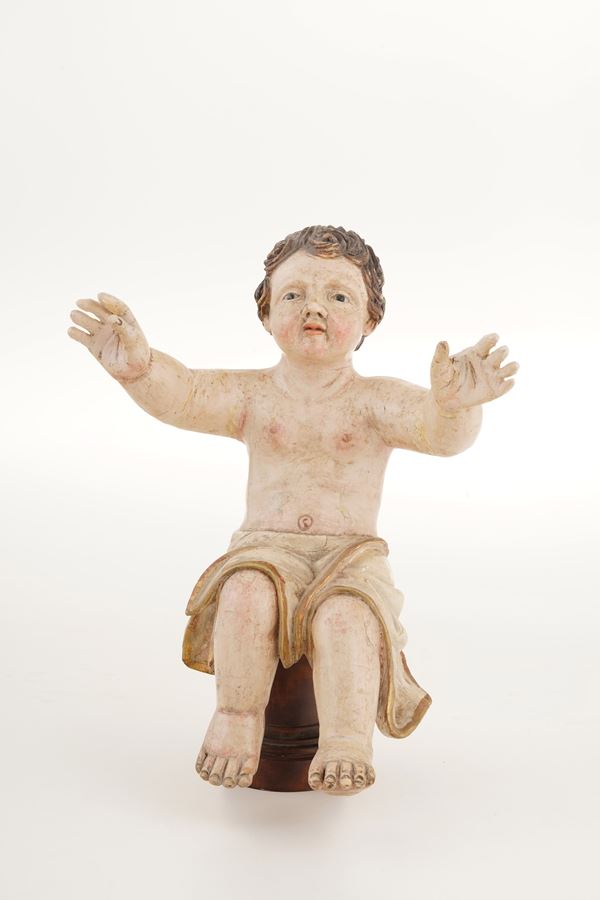 Gesù Bambino in legno dipinto. XX secolo
