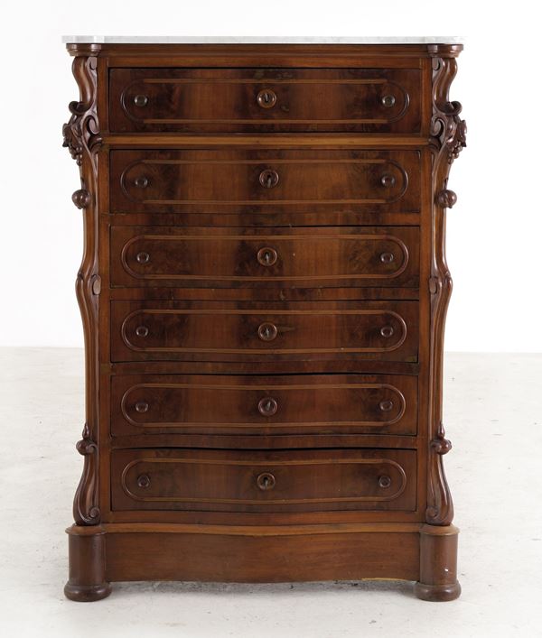 Secretaire a sei cassetti in legno intagliato. XIX secolo