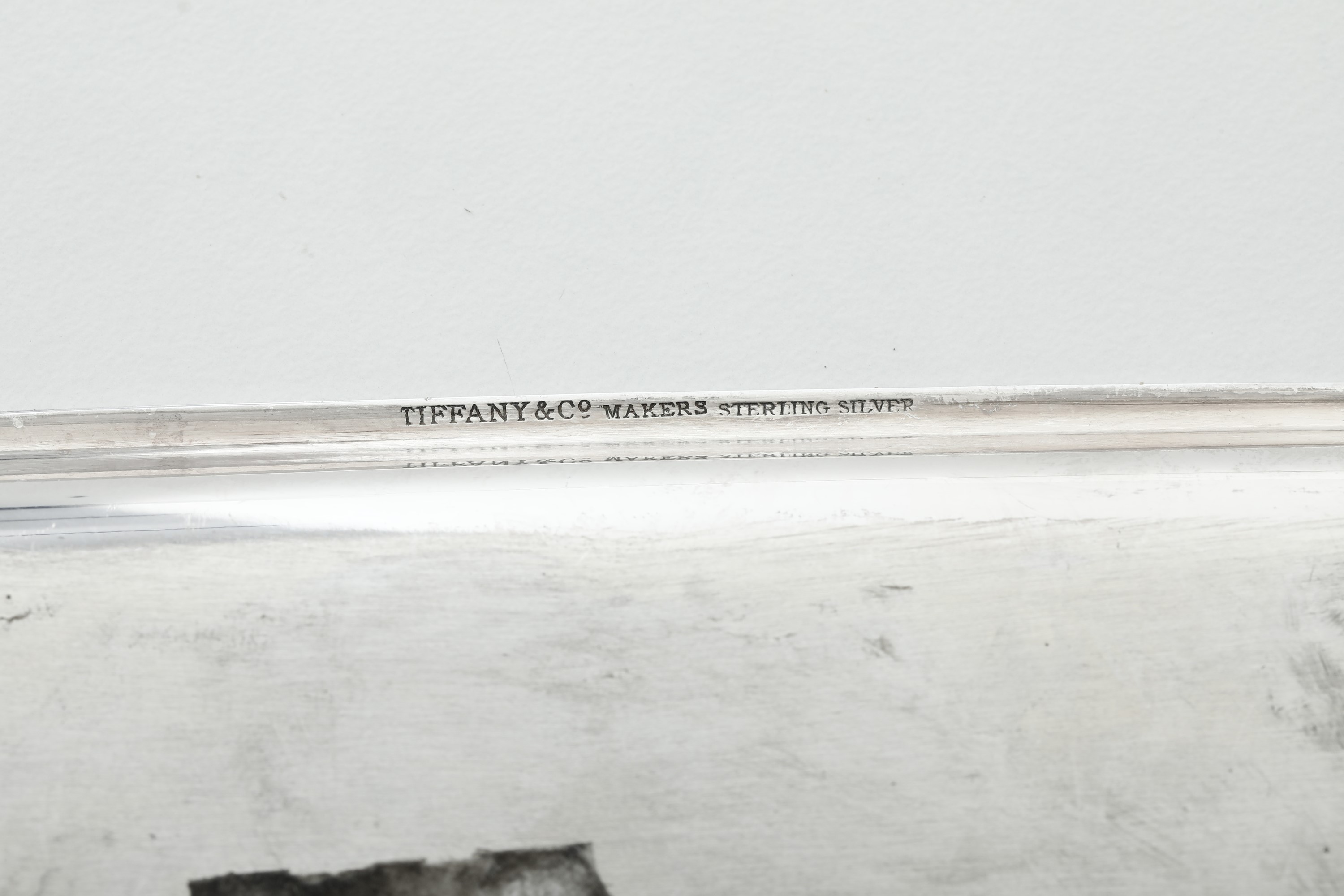 Tiffany & Co., Svuotatasche in argento fuso sagomato e cesellato (USA), XX secolo