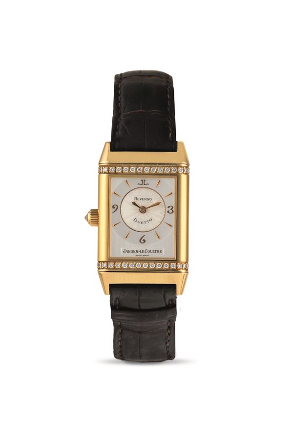 Reverso Duetto Lady in 18k yellow gold with diamonds, double dial complete with original box and guar [..]