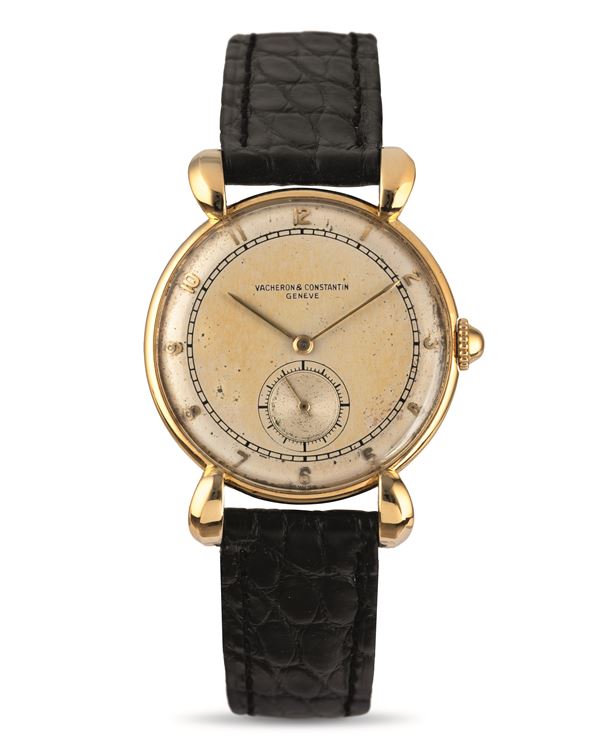 Fascinating wristwatch with 18k yellow gold teardrop lugs, two-tone dial with seconds down hand windi [..]