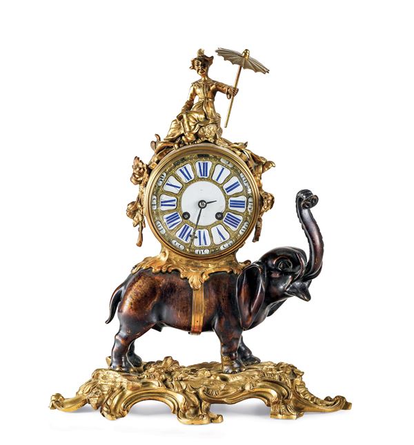 Pendola in bronzo dorato e patinato. Francia, seconda metà del XIX secolo