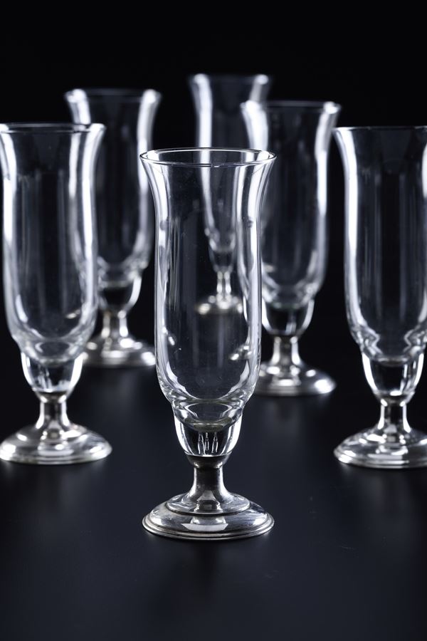 Dodici flûtes. Manifattura fiorentina del XX secolo. Argentiere Ermanno Zaccarini.