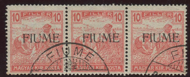 1918, Fiume, serie “Mietitori”, 10 filler carminio striscia di tre usata.  - Auction Postal History and Philately - Cambi Casa d'Aste
