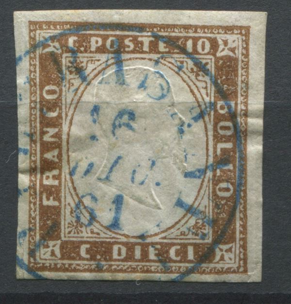 1861, Regno di Sardegna, 10 cent. bruno chiaro (14Cm) annullo PIETRASANTA in azzurro (punti 8)