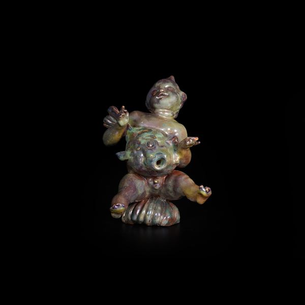 Figura di putto con pesce alla maniera di Melandri, XX secolo.