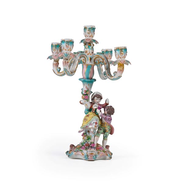 Candelabro figurato.<BR>Probabilmente Germania, Turingia, seconda metà del XIX secolo.
