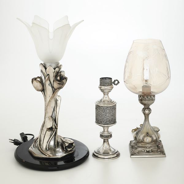 Tre lampade da tavolo rivestite in argento. Differenti argenterie italiane del XX secolo