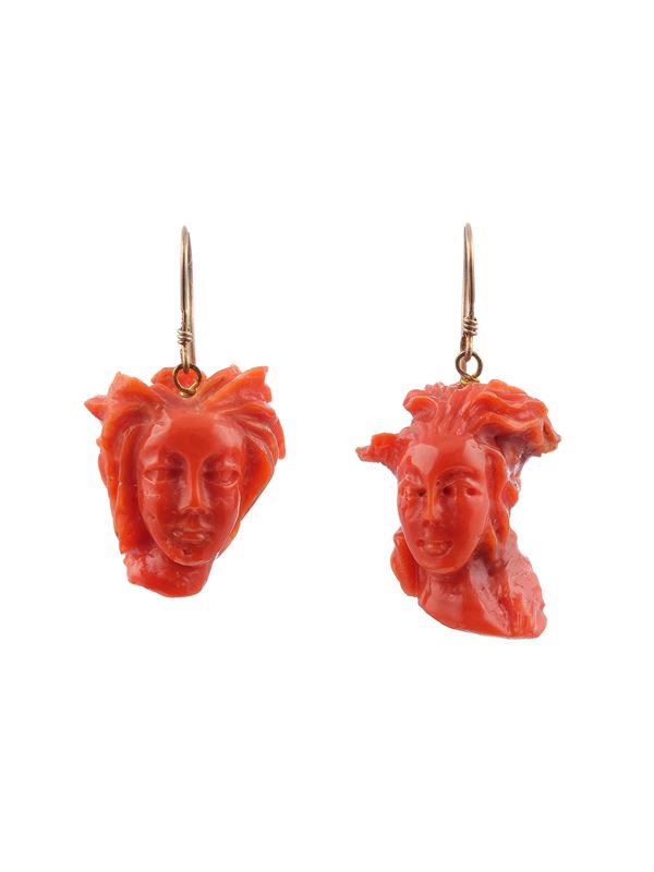 Pair of carved coral and low-karat gold earrings